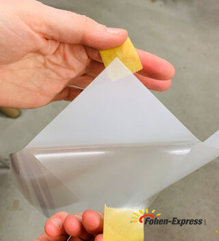 Schutzfolie entfernen
